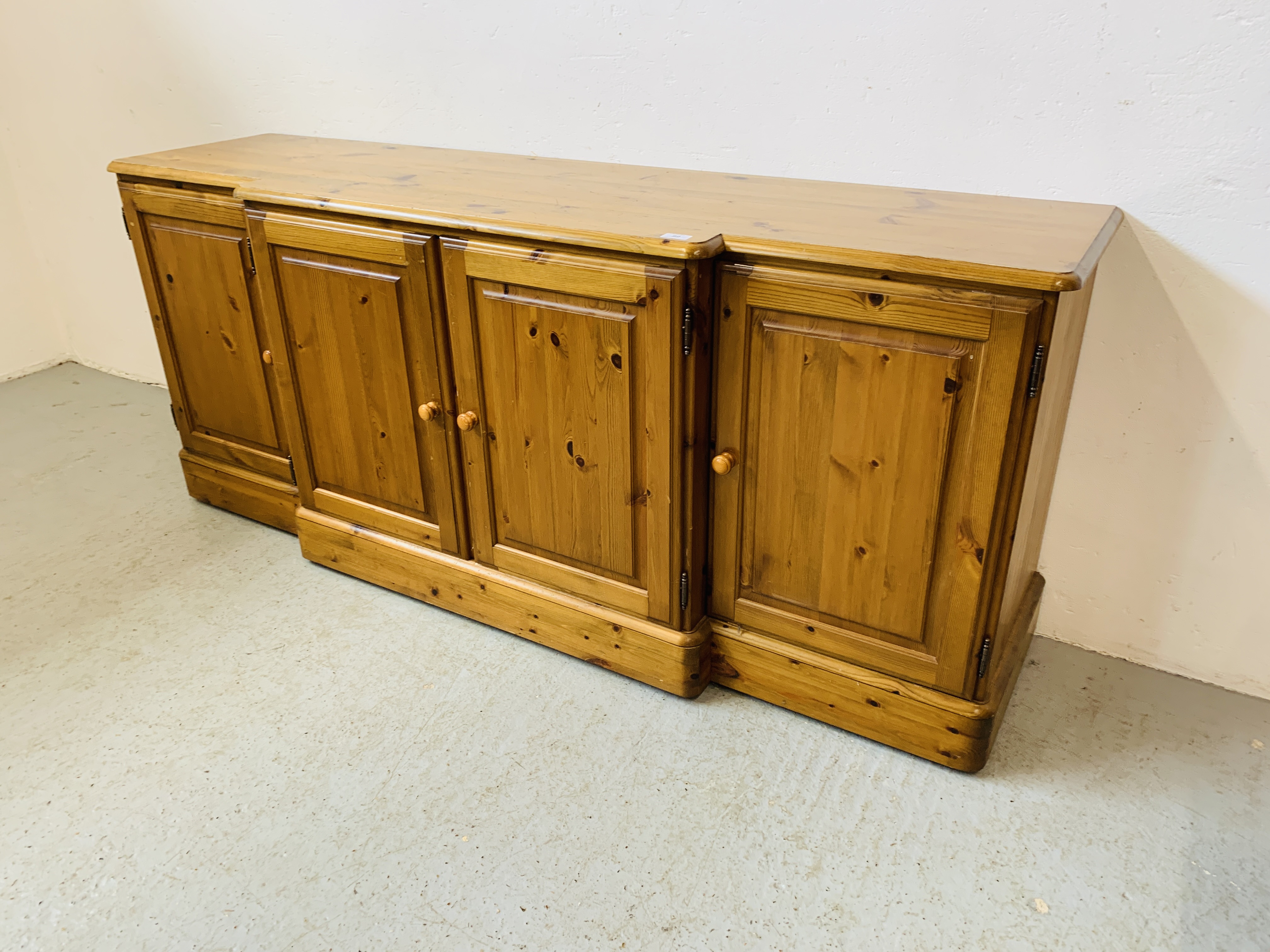 A DUCAL HONEY PINE BREAK FRONT FOUR DOOR DRESSER BASE - W 175 CM. D 46CM. H 75CM. - Image 4 of 9