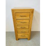 A MODERN LIGHT OAK FIVE DRAWER CHEST - W 51CM. D 40CM. H 107CM.