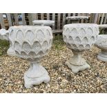 A PAIR OF LARGE FOOTED GARDEN PLANTING URNS - HEIGHT 60 CM. DIAMETER 40 CM.