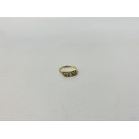 18CT GOLD FIVE STONE DIAMOND RING