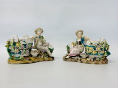 PAIR OF C19TH VOLKSTEDT SWEETMEAT DISHES WITH BOY AND GIRL FIGURES IN CLASSICAL DRESS.