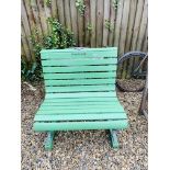 A VINTAGE ROLL BACK BENCH WITH GREEN PAINTED SLATS LENGTH 85CM ALONG WITH A DECORATIVE CAST
