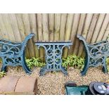 TWO PAIRS OF DECORATIVE CAST IRON BED ENDS AND PAIR OF CAST IRON TABLE ENDS