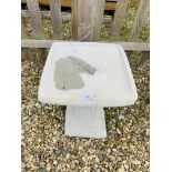 A STONEWORK PEDESTAL GARDEN BIRD BATH WITH SQUARE TOP AND ROSE DESIGN - HEIGHT 50 CM. WIDTH 40 CM.