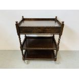 AN OAK THREE TIER BARLEY TWIST AND BOBBIN DETAILED HOSTESS TROLLEY WITH DRAWER - W 65CM. D 39CM.