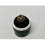 A 9CT GOLD DRESS RING SET WITH SMOKEY QUARTZ