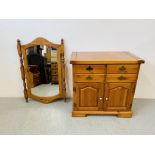 A HONEY PINE DRESSER BASE THE FOUR DRAWERS ABOVE TWO CABINET DOORS ALONG WITH A HONEY PINE FRAMED