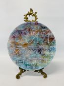 AN ENAMELLED METAL CHARGER, BY R. CASEY, INSCRIBED AND DATED LONDON 1983, DIAMETER 36 CM.