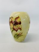 MOORCROFT VASE BEARING SIGNATURE TO BASE - LILY DESIGN. H 18CM.