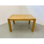 AN ERCOL "BOSCO" OAK DESIGNER DINING TABLE 130CM X 90CM