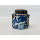 UNUSUAL ORIENTAL LIDDED JAR ON A MAINLY BLUE BACKGROUND WITH ORANGE FLOWERS