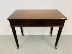 A VICTORIAN MAHOGANY TWO DRAWER SIDE TABLE, THE REEDED LEG FINISHING WITH BRASS CASTERS - W 92CM.