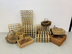 A GROUP OF ASSORTED WICKER BASKET WARE 8 PIECES ALONG WITH SIX SECTION WINE RACK