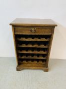A REPRODUCTION OAK 25 BOTTLE WINE CELLAR WITH DRAWER TO TOP