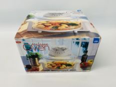 AN UNUSED HALOGEN OVEN BOXED WITH COOKBOOK - SOLD AS SEEN
