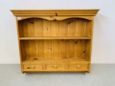 A HONEY PINE TWO TIER BRACKET SHELF WITH BOARDED BACK AND THREE DRAWERS W 102CM,