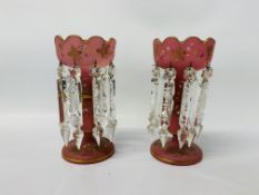 A PAIR OF VICTORIAN PINK GLASS TABLE LUSTRES