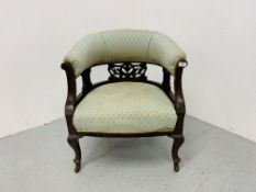 A VICTORIAN TUB CHAIR WITH GREEN UPHOLSTERY TO SEAT AND BACK