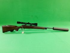 A REMINGTON .222 BOLT ACTION RIFLE (REF 899) FITTED WITH .