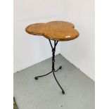AN UNUSUAL WROUGHT METAL OCCASIONAL TABLE WITH WOODEN CLOVERLEAF SHAPED TOP