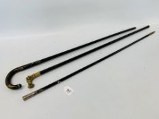 COLLECTION OF THREE WALKING STICKS TO INCLUDE SILVER TOPPED AND SILVER BANDED PLUS BRASS CASTING