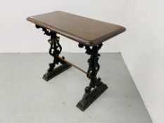 A SMALL RECTANGULAR VINTAGE BAR TABLE WITH HEAVY ORNATE CAST IRON BASE. L 92CM. W 45CM. H 75CM.