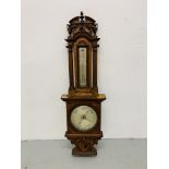 AN IMPRESSIVE CARVED OAK ANAROID BAROMETER BY NEGRETTI & ZAMBRA.