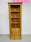 A WAXED PINE FULL HEIGHT CORNER SHELF UNIT WITH CABINET TO BASE H 198CM,