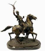 A LARGE IMPRESSIVE BRONZE OF A FALCONER ON HORSEBACK BEARING SIGNATURE F.