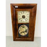 AN AMERICAN STYLE STRIKING WALL CLOCK - THE DOOR PANEL DEPICTING AN AUSTRIAN SLEDDING SCENE