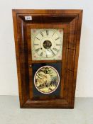 AN AMERICAN STYLE STRIKING WALL CLOCK - THE DOOR PANEL DEPICTING AN AUSTRIAN SLEDDING SCENE