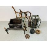 A PAIR OF HEAVY CAST IRON BENCH ENDS (ONE A/F), A HEAVY CAST METAL FIRE BASKET, CAST IRON KETTLE,