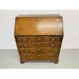 AN 18TH C. OAK FOUR DRAWER BUREAU. W 85CM. D 46CM. H 102CM.