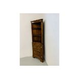 A QUALITY OAK TITCHMARSH AND GOODWIN CORNER CABINET WITH SHELVED TOP W 65CM,