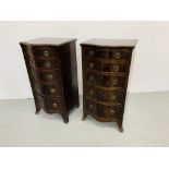 A PAIR OF REPRODUCTION MAHOGANY FINISH SERPENTINE FIVE DRAWER CHESTS