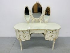 A CONTINENTAL CREAM FINISH KNEE HOLE DRESSING TABLE WITH TRIPLE VANITY MIRRORS W 135CM
