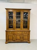 A GOOD QUALITY REPRODUCTION SOLID OAK DISPLAY CABINET WITH DRAWER AND CABINET BASE W 165CM, D 50CM,