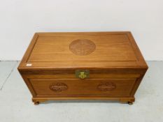 A ORIENTAL DESIGN HARDWOOD BLANKET BOX WITH CAMPHOR WOOD LINING W 103CM, D 53CM,