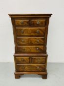 A REPRODUCTION MAHOGANY MINIATURE CHEST ON CHEST - W 41CM. H 77CM. D 30CM.