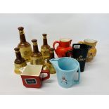 5 WADE WHISKY BELLS (EMPTY) ALONG WITH 2 CARLTON WARE HAIG WHISKY JUGS,