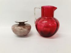 VINTAGE CRANBERRY JUG - H 18CM ALONG WITH AN ART GLASS VASE - H 9CM.