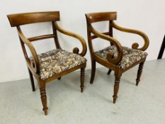 A PAIR OF MAHOGANY BAR BACK SCROLLED ARM ELBOW CHAIRS