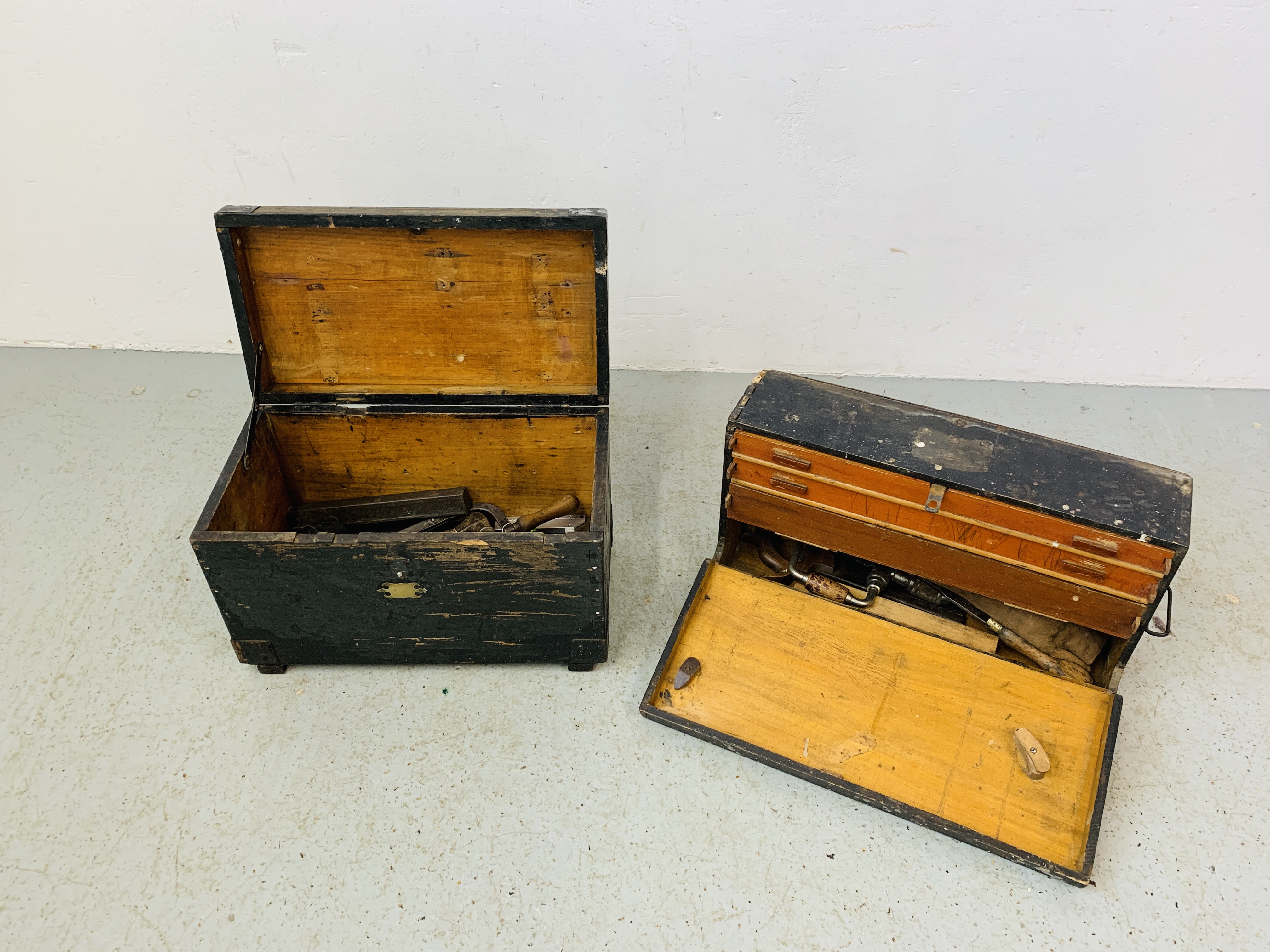 2 WOODEN CARPENTRY BOXES CONTAINING VARIOUS HAND TOOLS TO INCLUDE PLANES, FILES, MEASURES ETC.