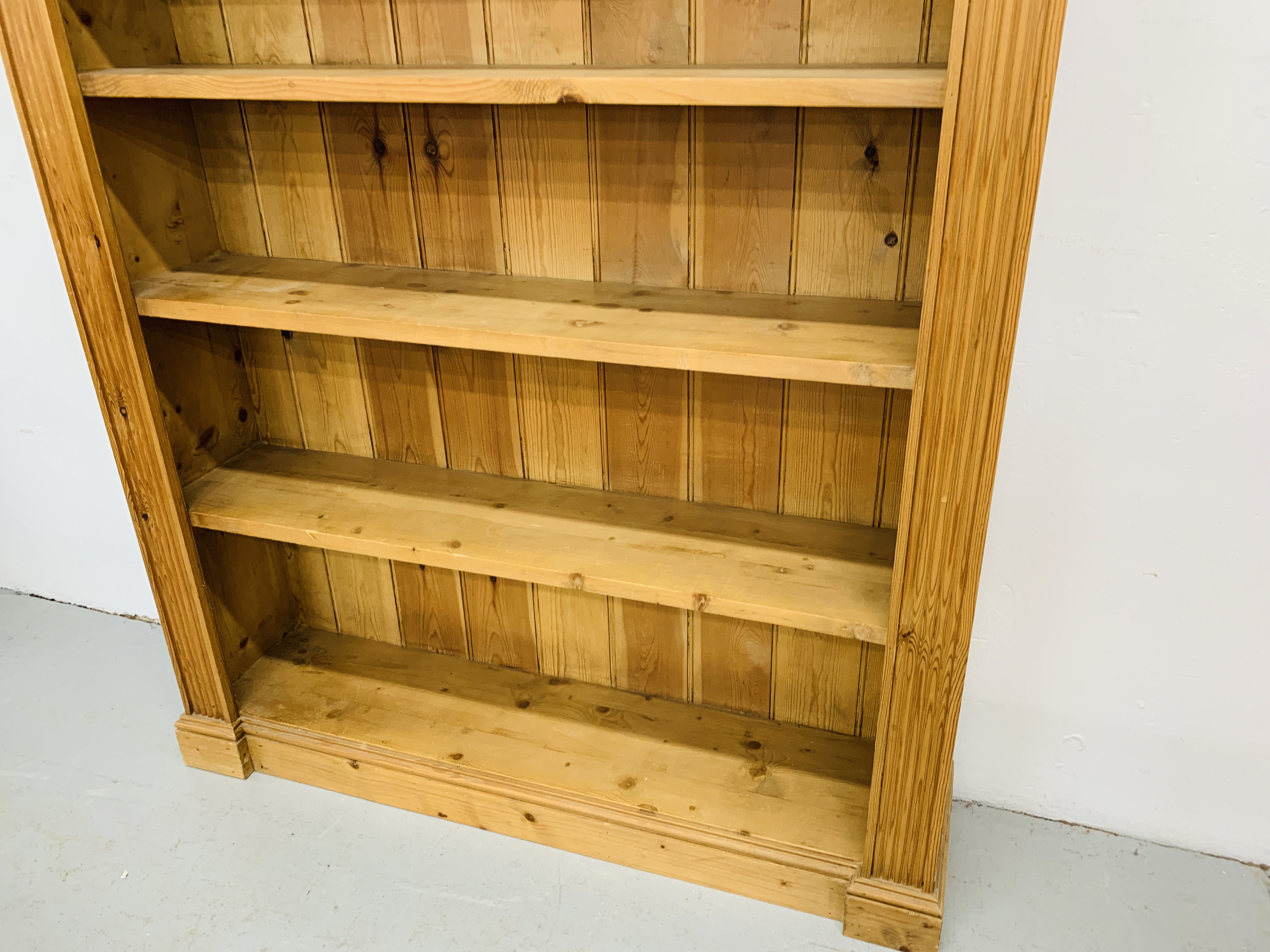 A SOLID WAXED PINE FULL HEIGHT BOOKSHELF - H 198 CM. W 138CM. - Image 4 of 5