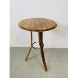 A CIRCULAR TRIPOD BASE OAK TABLE WITH METAL CRAFT DETAIL (CONVERTED FROM WHISKY BARREL)