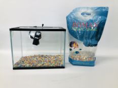 A FISH TANK WITH FILTER AND ROMAN RAINBOW GRAVEL - SOLD AS SEEN