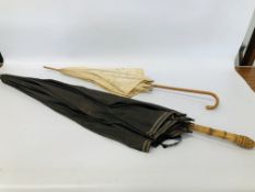 AN EDWARDIAN PARAGON FOX GARDEN UMBRELLA ALONG WITH A VINTAGE COTTON UMBRELLA