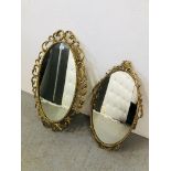 TWO OVAL GILT FRAMED WALL MIRRORS (HEIGHTS 82CM AND 66CM)