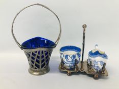 PLATED BASKET WITH A BLUE GLASS LINER ALONG WITH A PLATED STAND INSET WITH BLUE AND WHITE COPELANDS