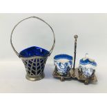 PLATED BASKET WITH A BLUE GLASS LINER ALONG WITH A PLATED STAND INSET WITH BLUE AND WHITE COPELANDS